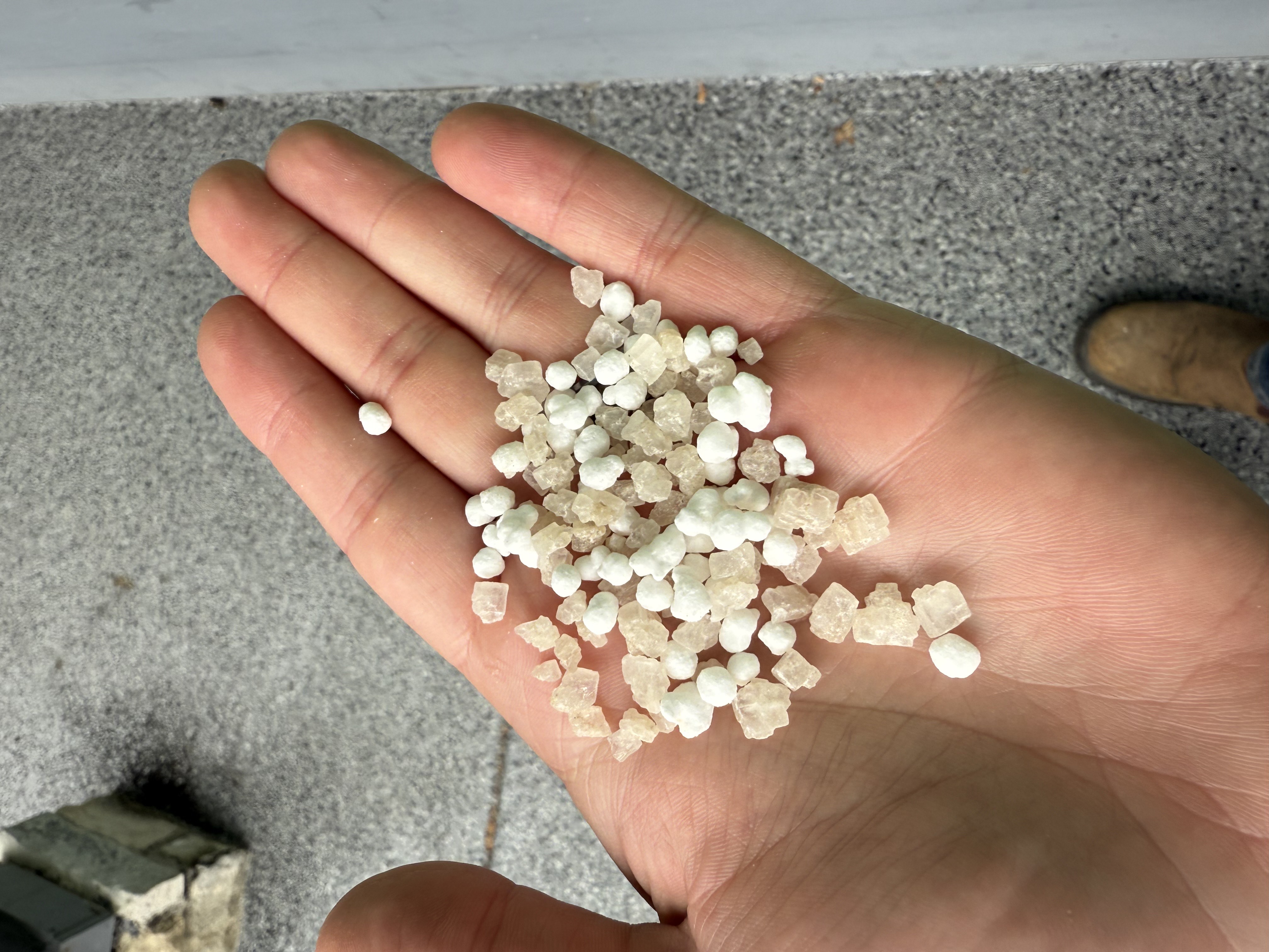 A close-up of deicing granules